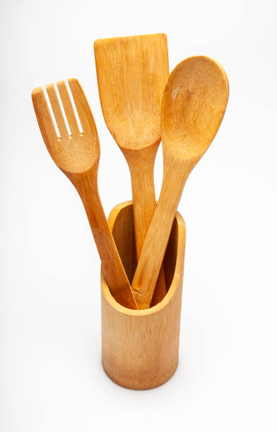 istock Wooden Fork and Spoon for Cooking on White Background 1336891058