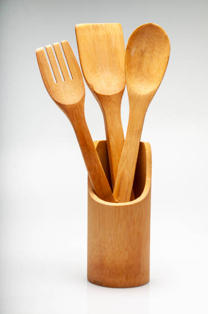 istock Wooden Fork and Spoon for Cooking on White Background 1336891124
