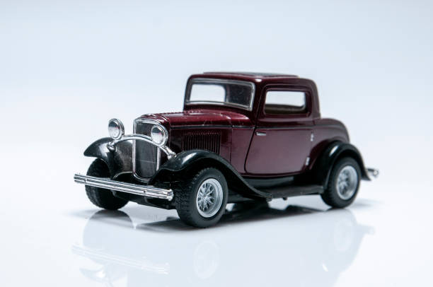 istock Classic Model Toy Car on White Background 1336891146