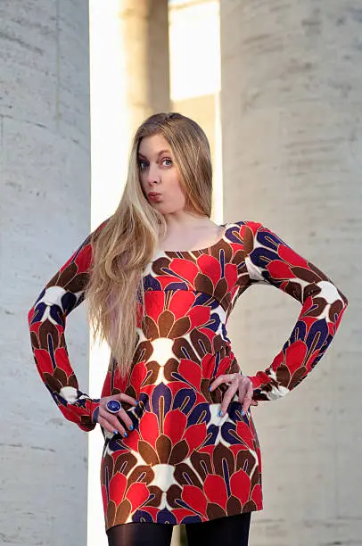 Photo of Woman with blonde hair and Red Dress Patterned