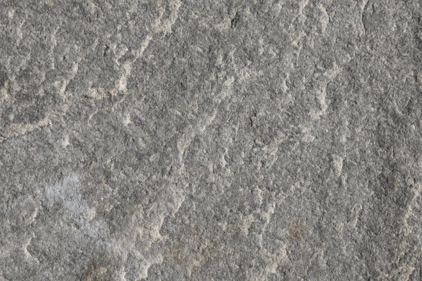 istock Detail of gray granite stone surface 1336902835