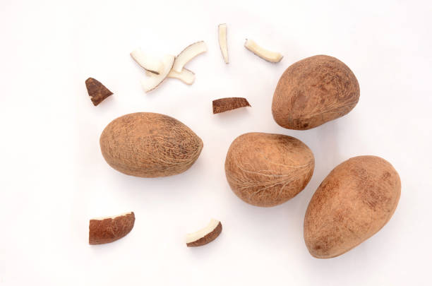 istock bunch the healthy brown white drilled coconut isolated on white background. 1336908809