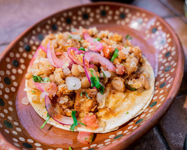 istock Delicious chicharron taco and carnitas Mexican style. 1336908931