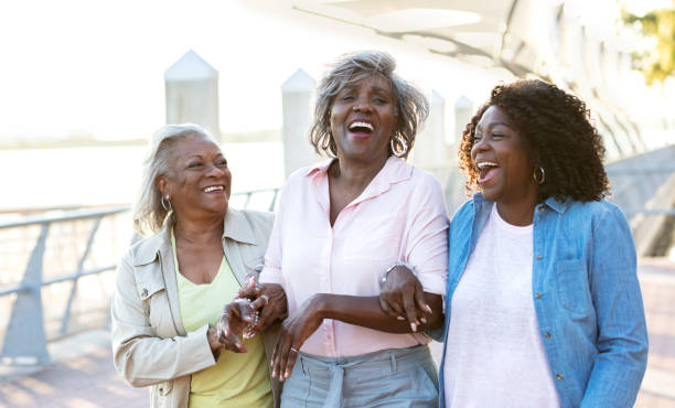 istock Three senior African-American women walking, laughing 1336910080