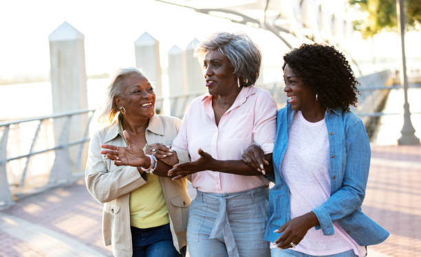 istock Three senior African-American women walking, talking 1336910090