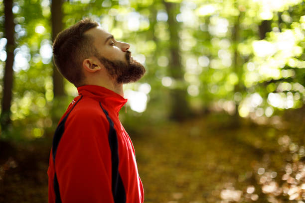 istock Young man enjoying nature 1336911083