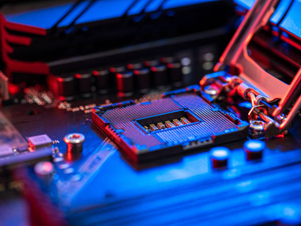istock manipulating and installing processor on the motherboard in details with blur and selective focus 1336917713