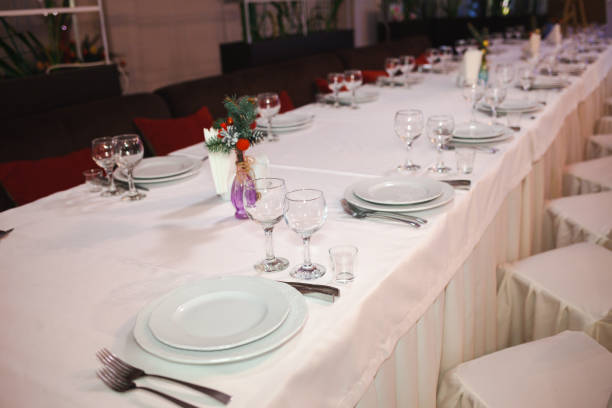 istock Beautiful table served with glassware and cultery, prepared for festive event. Special occasion celebrted in luxury restaurant or cafe. Table setting concept. Wedding table. 1336917849