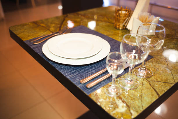 istock Wine glasses on a white table cloth. 1336917905