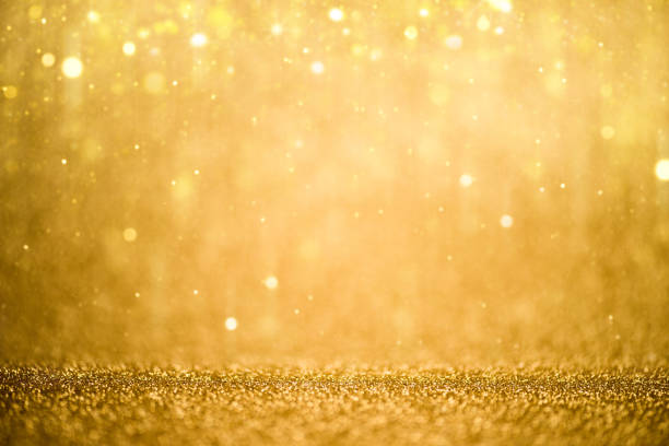 Glitter Golden Lights Defocused Background stock photo