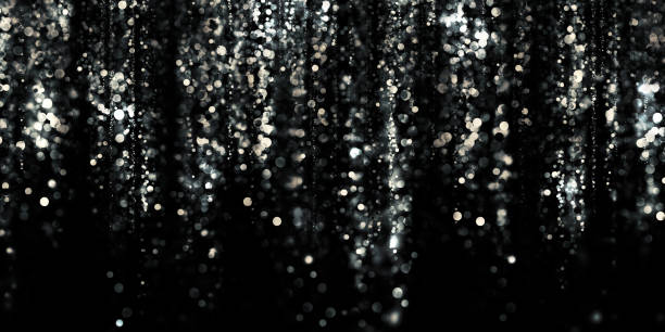 istock floating silver bokeh black background silver stardust 3D illustration 1336927860