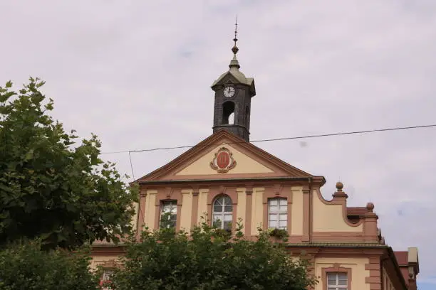 August 05, 2021, Rastatt: House gable with a small tower in the old town of Rastatt in Baden-Württemberg