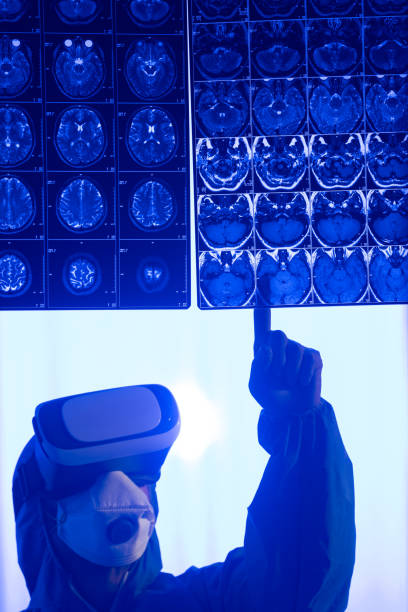 istock Radiologist Wearing VR Head Set And Analyzing CT Images 1336940076