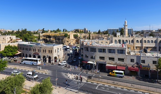 East Jerusalem, Palestine, May 5, 2019: Aerial view of the the Sultan Suleiman Street in East Jerusalem near to Old City and Damascus Gate. This busy street is the center of the Palestinian community in Jerusalem.