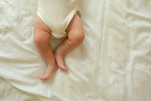 istock close up newborn feet on white blanket 1336949198