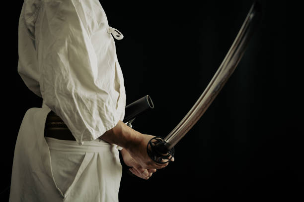 istock Portrait of samurai and his japanese sword 1336956147