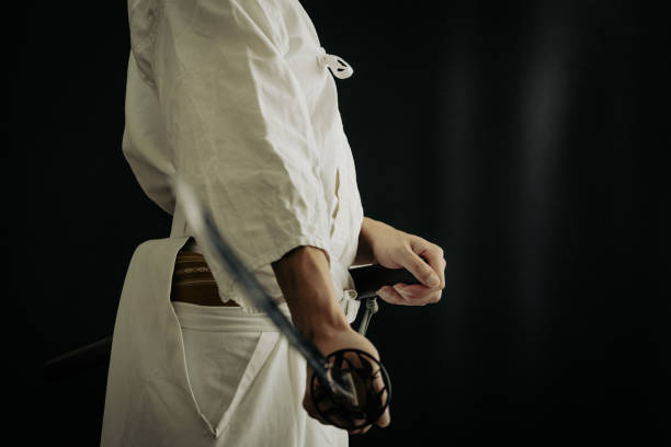 istock Portrait of samurai and his japanese sword 1336956150