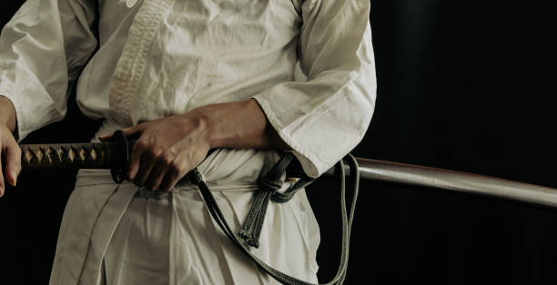 istock Portrait of samurai and his japanese sword 1336956172