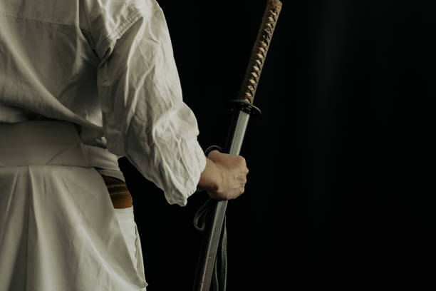 istock Portrait of samurai and his japanese sword 1336956180