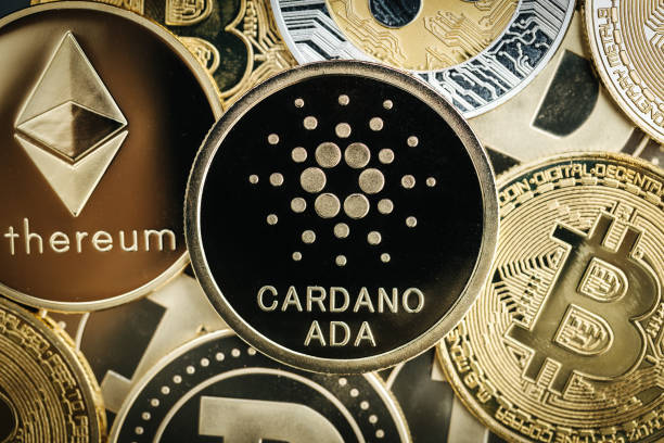 Cardano Ada cryptocurrency coin close-up, on top of other cryptocurrency coins Physical Cardano cryptocurrency coin close-up, on top of other cryptocurrency coins altcoin photos stock pictures, royalty-free photos & images