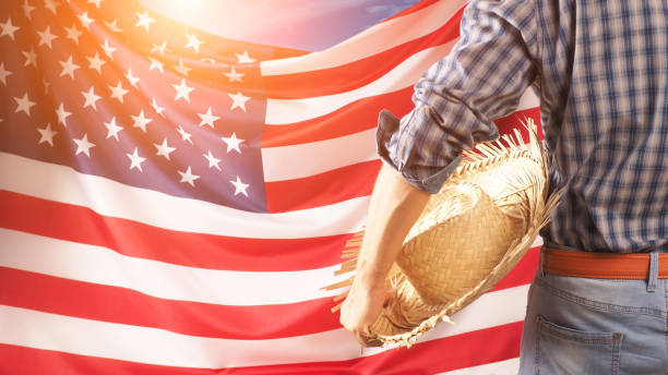 istock Worker on nation flag background. Labor day holiday concept. USA 1336960031