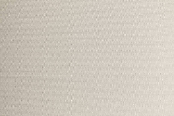istock Cotton silk texture background in light sepia grey color 1336961757
