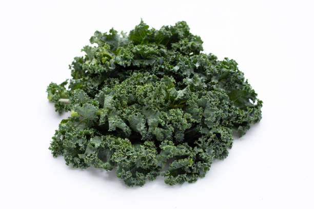 istock Kale leaves on white background. Top view 1336966898