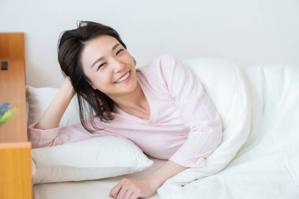 istock asian woman in night clothes,Smile 1336971709