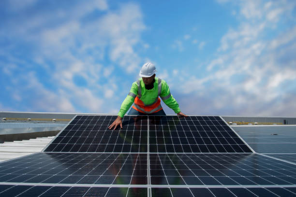 Free Stock Photo of Engineer in charge of solar panel installation ...