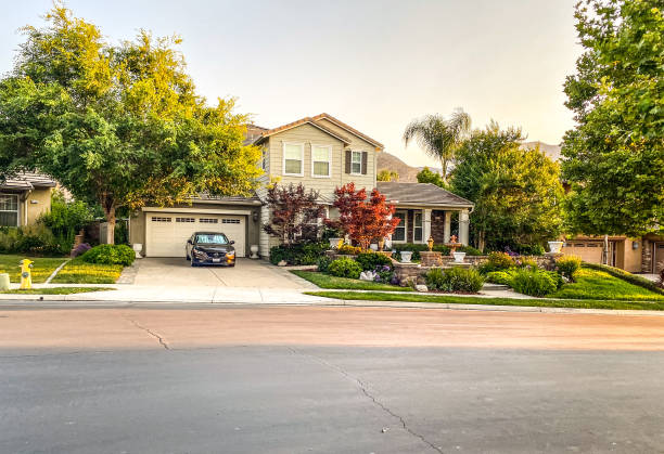 Beautiful clear day with extremely large grass space in back of house