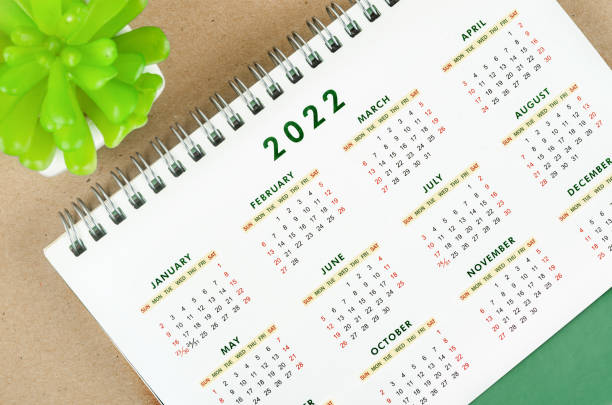 istock 12 months desk calendar 2022 with plant pot. 1336982894