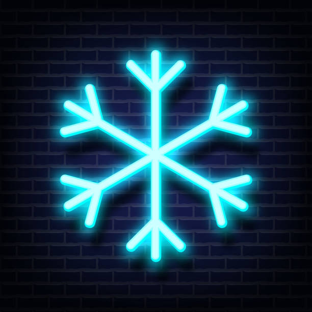 istock Snowflake blue shape design neon light style. Electric sign glowing isolated on dark brick wall background. Symbol of winter, temperature, weather. Abstract element for decor. Vector illustration. 1336983838