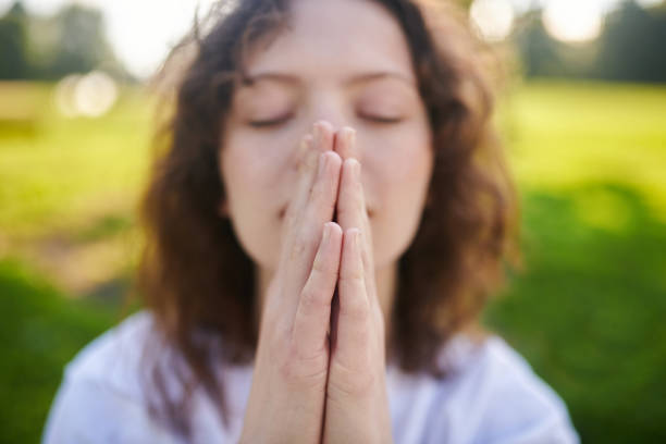 istock A ginger young meditating in the park and looking peaceful 1336995660