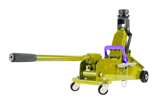 istock yellow hydraulic car jack isolated on white background, lifted up 1336998237