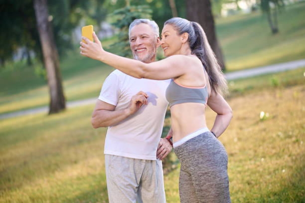 istock A mature happy couple making selfie and looking contented 1336998336
