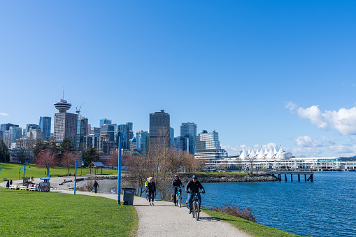 CRAB Park at Portside, on the Vancouver City Harbour shore. Modern city skyline. BC, Canada.