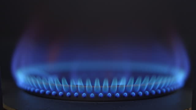 SLO MO Ignition of a blue flame of gas stove,Close-up