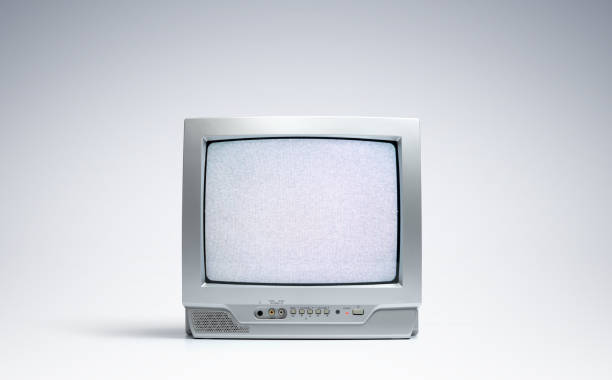 istock Working old CRT TV on the screen noise and interference on light background. File contains a path to isolation. 1337013478
