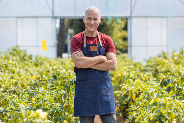 istock Greenhouse entrepreneur with arms crossed 1337013813