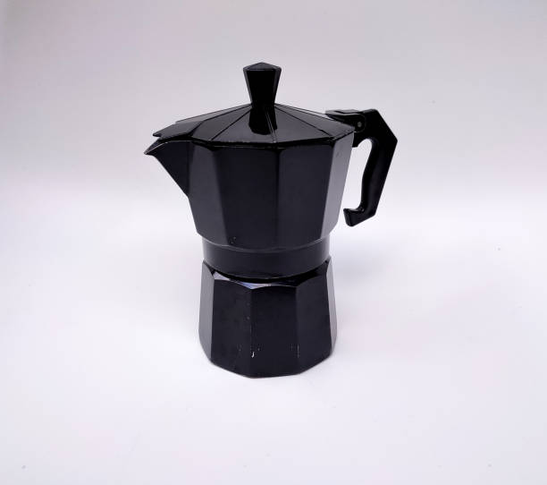 istock Black old moka pot isolated on white background. 1337017391