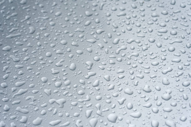istock Raindrops on the metallic hood 1337017975