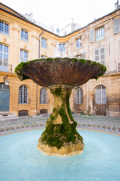 Fountain in Place d'Albertas in Aix-en-Provence, France, in a sunny day stock photo