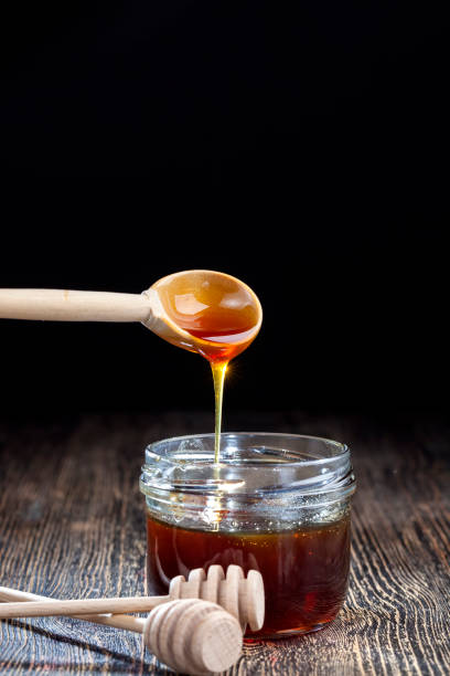 istock current thick and delicious sweet honey, close up 1337028217