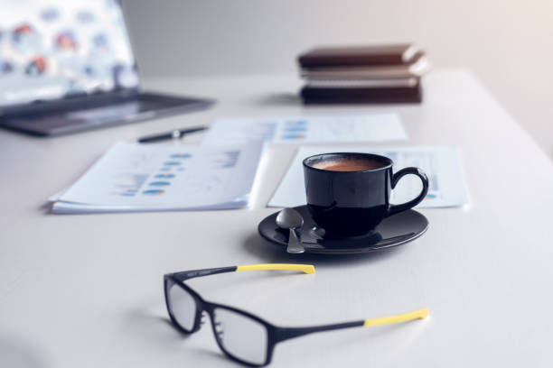 istock Coffee and glasses on the desk 1337029375