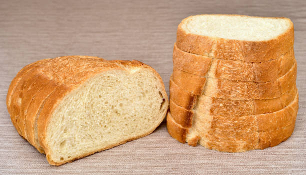 istock Stack of sliced homemade white bread on the table 1337029680