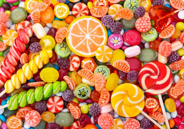 istock Colorful lollipops and different colored round candy. 1337037553