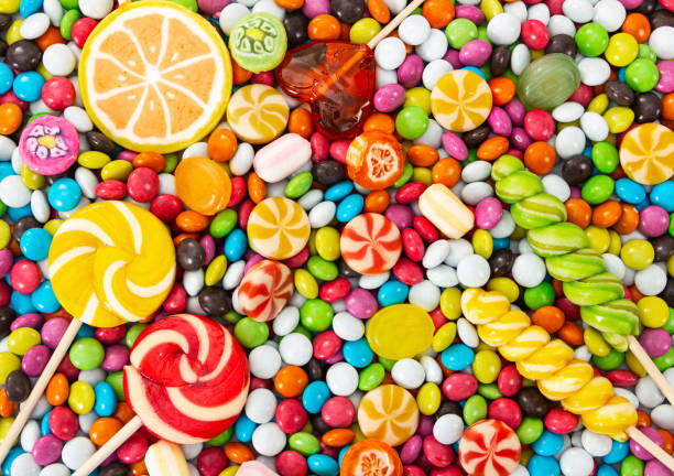 istock Colorful lollipops and different colored round candy. 1337037554