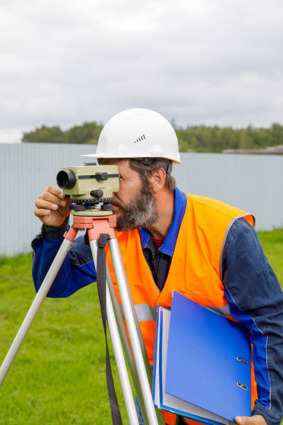 istock A male engineer works with the optical level on site. 1337042111