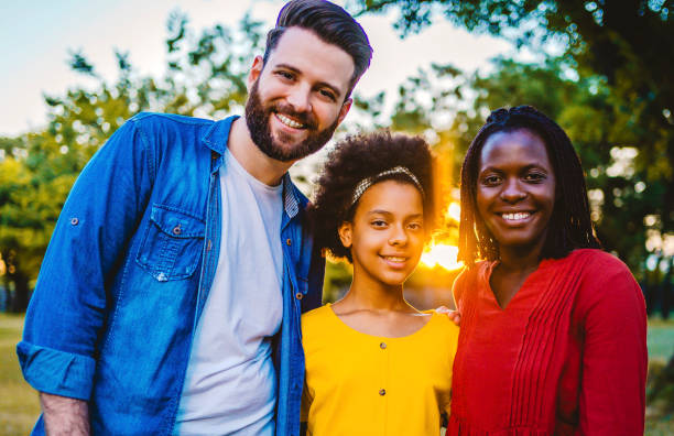 istock Multi ethnic family in the park 1337044301