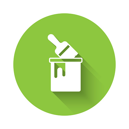 istock White Paint bucket with brush icon isolated with long shadow background. Green circle button. Vector 1337045241